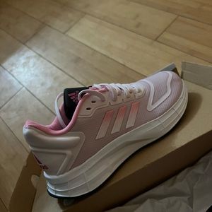 Woman’s size 7 adidas running shoe unworn brand new